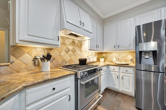 13538 Scenic Glade Dr, Houston, TX 77059 - kitchen with stainless steel appliances, white cabinets, crown molding, and dark wood finished floors