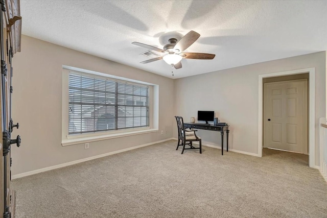 13538 Scenic Glade Dr, Houston, TX 77059 - office area with ceiling fan, carpet floors, baseboards, and a textured ceiling
