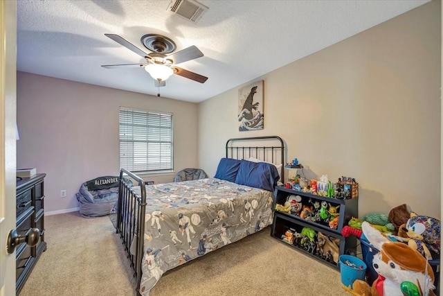 13538 Scenic Glade Dr, Houston, TX 77059 - carpeted bedroom with a ceiling fan and a textured ceiling