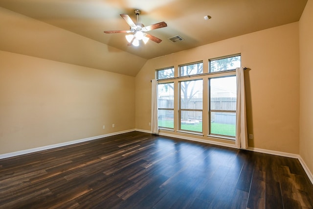 629 Pelican Harbour Dr, Texas City, TX 77590 - empty room with a ceiling fan, dark wood-style floors, baseboards, and lofted ceiling
