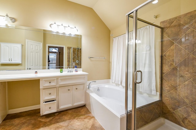 629 Pelican Harbour Dr, Texas City, TX 77590 - bathroom featuring vanity, vaulted ceiling, a garden tub, a stall shower, and tile patterned flooring