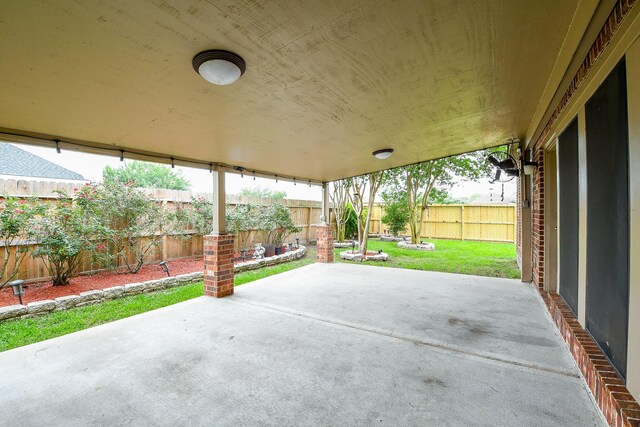 629 Pelican Harbour Dr, Texas City, TX 77590 - view of patio with a fenced backyard