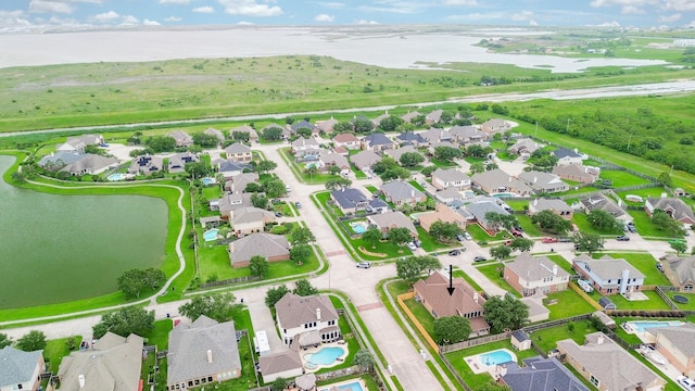 629 Pelican Harbour Dr, Texas City, TX 77590 - aerial view of residential area with a large body of water