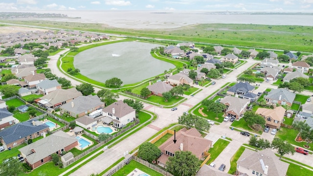 629 Pelican Harbour Dr, Texas City, TX 77590 - aerial view of property and surrounding area featuring a nearby body of water and nearby suburban area