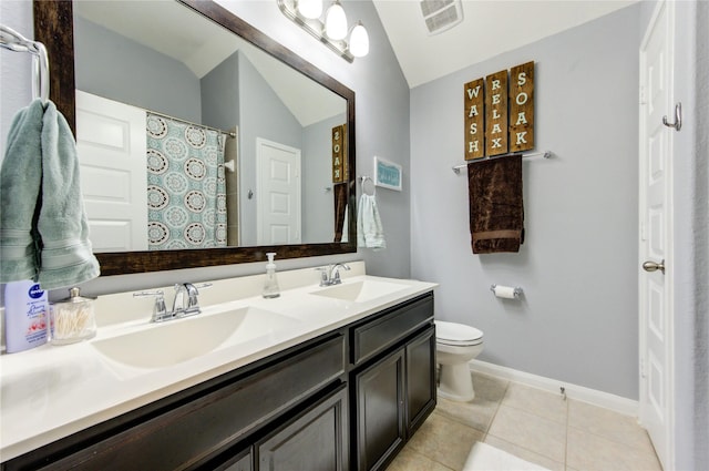 full bath with a sink, toilet, tile patterned floors, baseboards, and visible vents