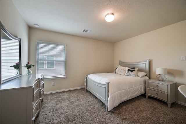 23109 Zinfandel Dr, Alvin, TX 77511 - bedroom featuring dark carpet and baseboards