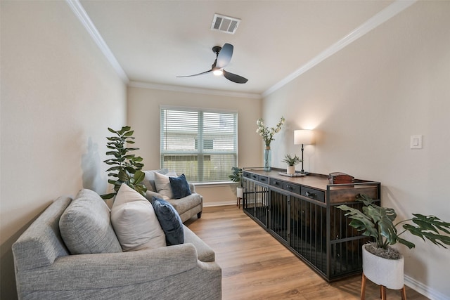 23109 Zinfandel Dr, Alvin, TX 77511 - sitting room featuring a ceiling fan, ornamental molding, light wood-style floors, and baseboards