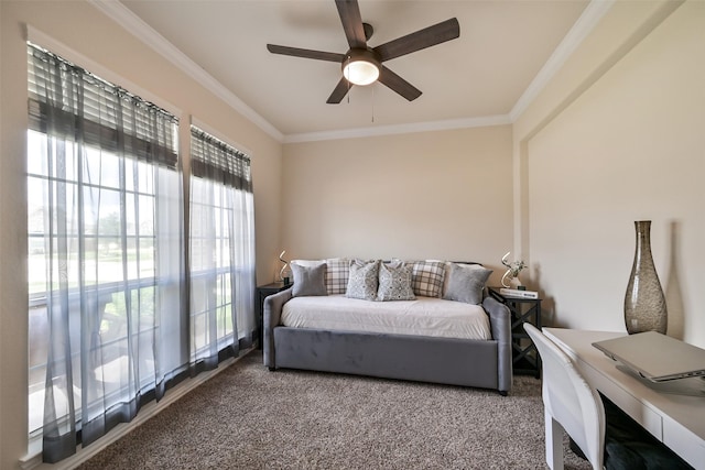 carpeted bedroom with crown molding and ceiling fan