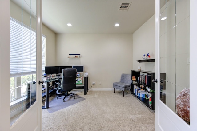 office featuring recessed lighting, carpet, baseboards, and a healthy amount of sunlight