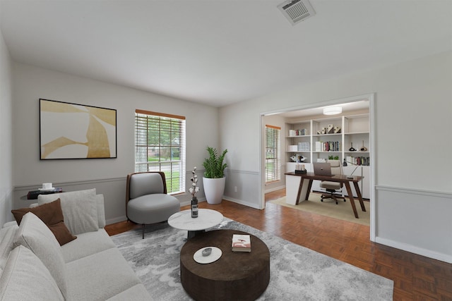 12510 Deep Spring Ln, Houston, TX 77077 - living room featuring baseboards and an office area