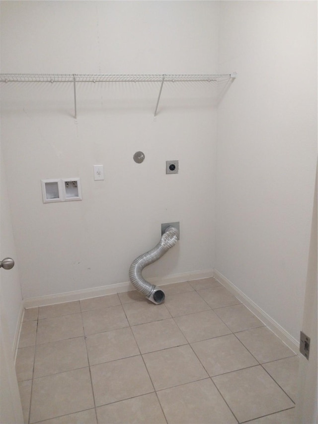 laundry area featuring hookup for an electric dryer, laundry area, light tile patterned floors, baseboards, and hookup for a washing machine