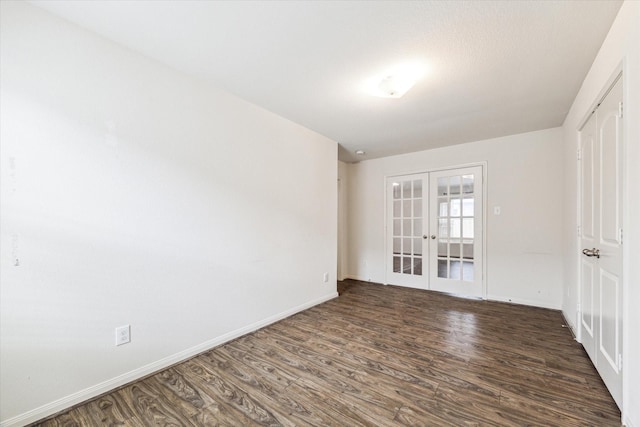 4910 Pacific Ridge Ln, Rosenberg, TX 77469 - empty room featuring french doors, wood finished floors, and baseboards
