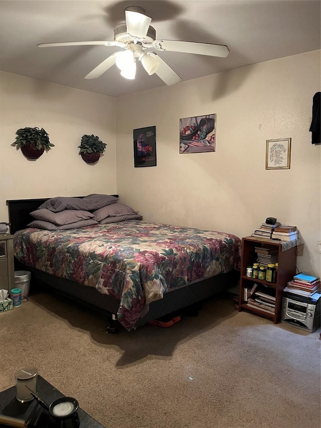 carpeted bedroom featuring a ceiling fan