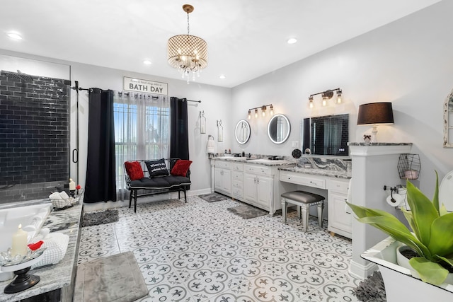 bathroom with recessed lighting, walk in shower, a chandelier, and vanity