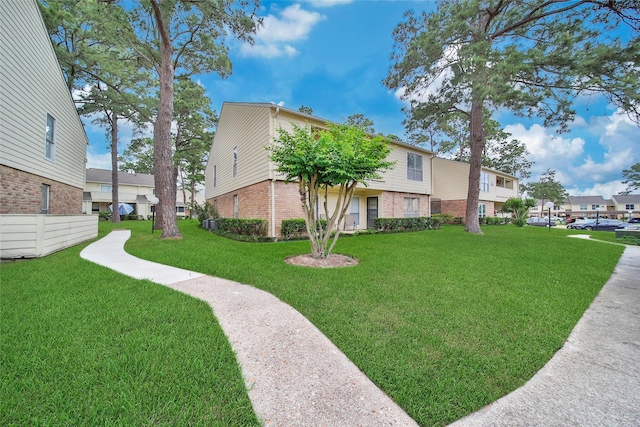 14515 Wunderlich Dr Unit 1602, Houston, TX 77069 - exterior space with a lawn and a residential view