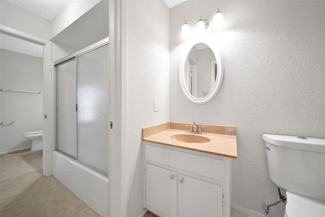 14515 Wunderlich Dr Unit 1602, Houston, TX 77069 - full bath featuring vanity, tile patterned floors, a textured wall, and enclosed tub / shower combo