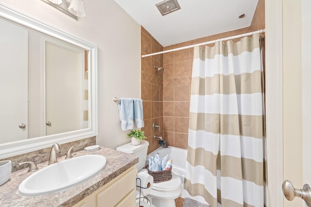 bathroom with vanity, toilet, and shower / tub combo with curtain