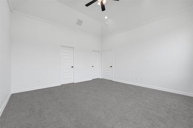 123 Big Spring Dr, Anahuac, TX 77514 - empty room with a ceiling fan, high vaulted ceiling, dark carpet, baseboards, and crown molding