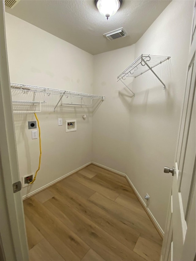 3006 Red Stag Pass, Missouri City, TX 77459 - clothes washing area featuring laundry area, visible vents, hookup for a gas dryer, hookup for a washing machine, and hookup for an electric dryer