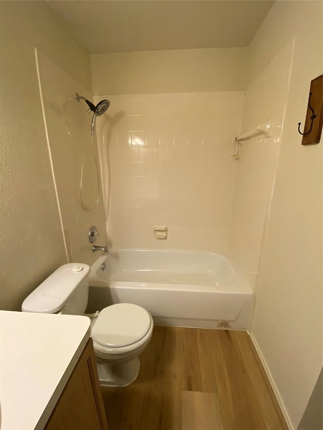 3006 Red Stag Pass, Missouri City, TX 77459 - full bathroom with toilet, bathtub / shower combination, wood finished floors, and vanity