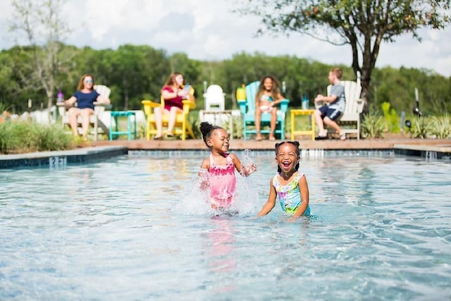 3006 Red Stag Pass, Missouri City, TX 77459 - pool featuring a water play area