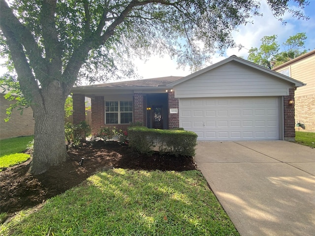 3006 Red Stag Pass, Missouri City, TX 77459 - ranch-style house with concrete driveway, brick siding, and a garage