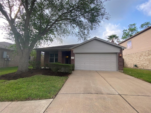 3006 Red Stag Pass, Missouri City, TX 77459 - single story home with brick siding, an attached garage, driveway, and a front lawn