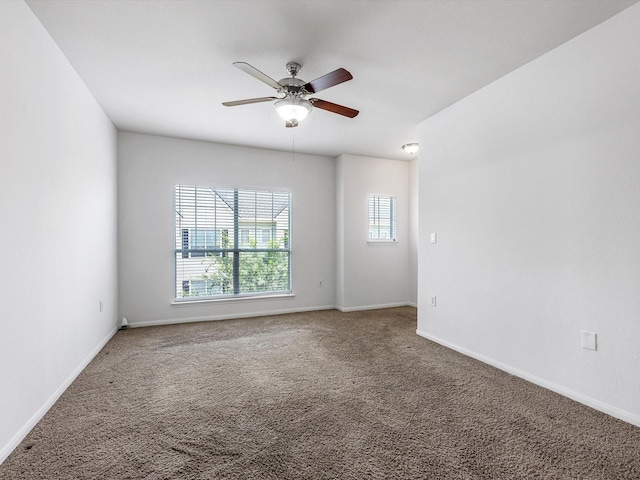 9200 Westheimer Rd Unit 1111, Houston, TX 77063 - spare room with a ceiling fan, carpet flooring, and baseboards