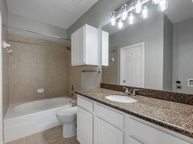 9200 Westheimer Rd Unit 1111, Houston, TX 77063 - bathroom featuring tile patterned flooring, washtub / shower combination, toilet, and vanity