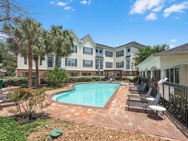 9200 Westheimer Rd Unit 1111, Houston, TX 77063 - community pool with a patio and fence