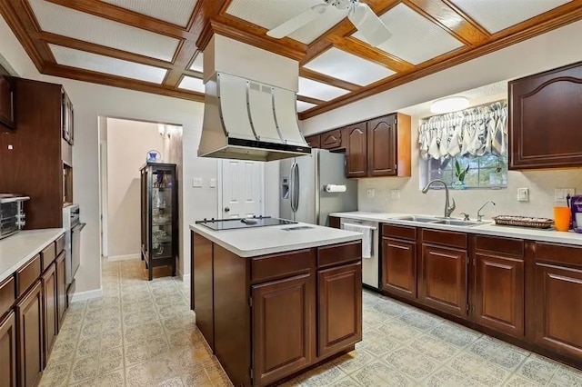 kitchen with a sink, light countertops, black appliances, beverage cooler, and extractor fan