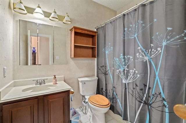 full bathroom featuring toilet, a shower with curtain, tile patterned flooring, and vanity