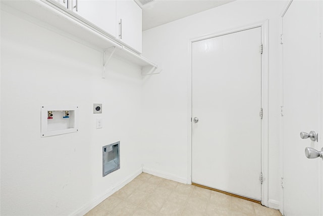 laundry area with cabinet space, hookup for an electric dryer, and hookup for a washing machine