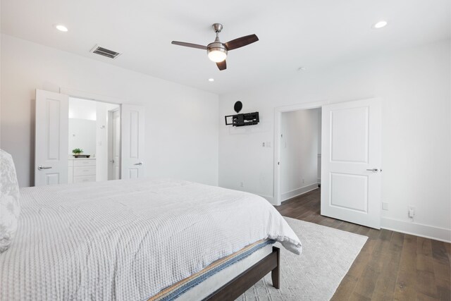 bedroom featuring recessed lighting, baseboards, visible vents, and wood finished floors