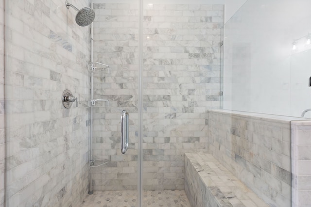 bathroom featuring a shower stall