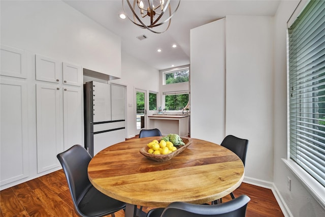dining room featuring visible vents, baseboards, recessed lighting, dark wood finished floors, and a notable chandelier