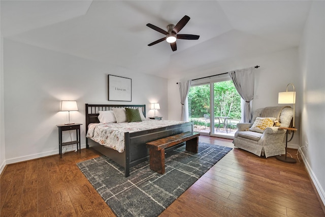 bedroom with baseboards, lofted ceiling, hardwood / wood-style flooring, and access to exterior