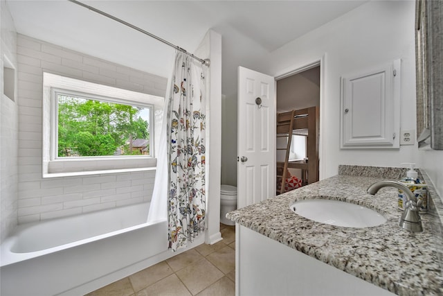 full bathroom featuring tile patterned floors, vanity, and toilet