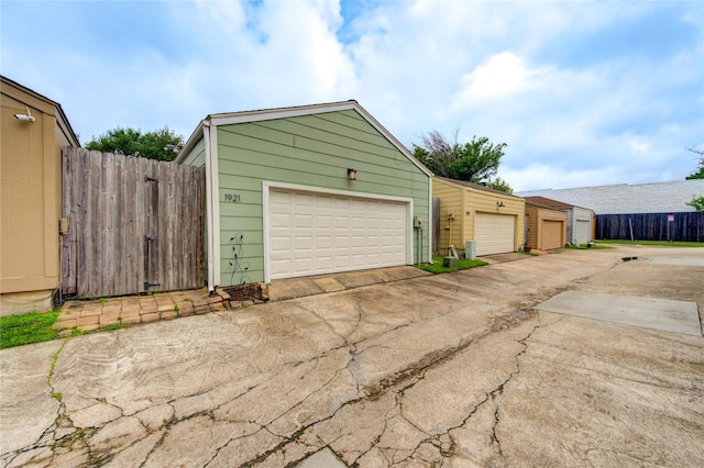 garage with fence