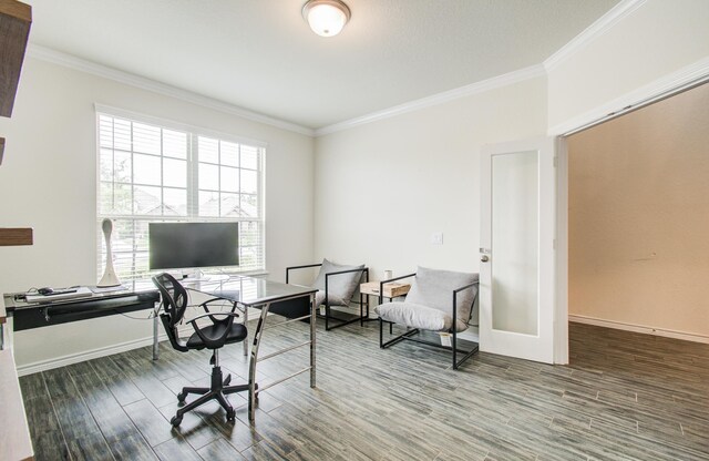 office space with baseboards, ornamental molding, and wood finished floors