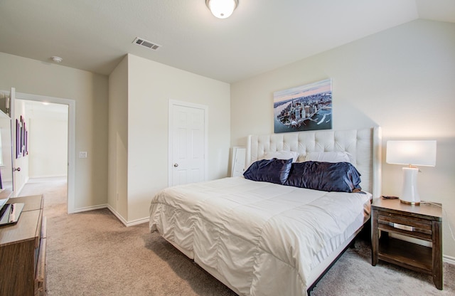 carpeted bedroom with baseboards and visible vents