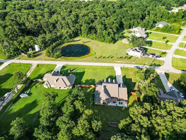 13882 Oak Manor Dr, Willis, TX 77318 - birds eye view of property featuring a residential view and a wooded view