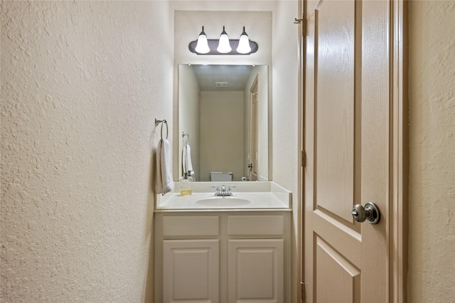 28406 Green Mill Ct, Spring, TX 77386 - half bath with vanity and a textured wall