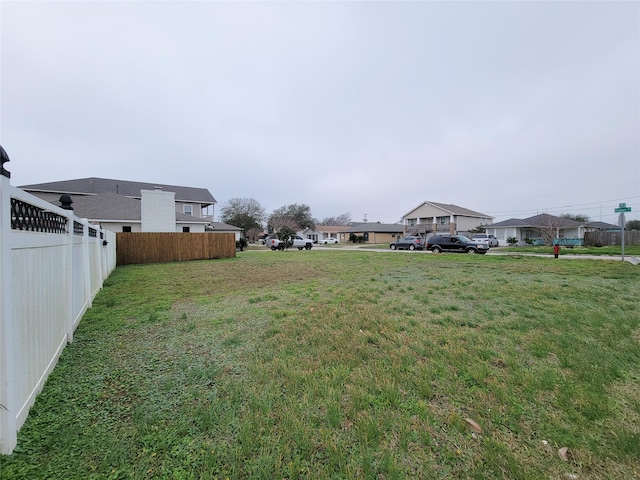 5703 Fraser Ave, Galveston, TX 77551 - view of yard featuring fence