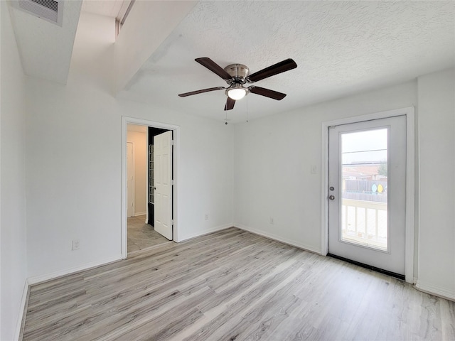 5703 Fraser Ave, Galveston, TX 77551 - spare room with a ceiling fan, baseboards, visible vents, and light wood-style floors