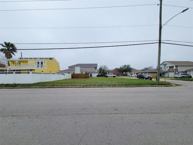 5703 Fraser Ave, Galveston, TX 77551 - view of street with street lighting and curbs