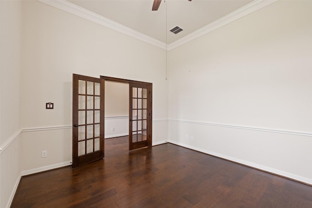 unfurnished room with crown molding, ceiling fan, french doors, wood finished floors, and visible vents