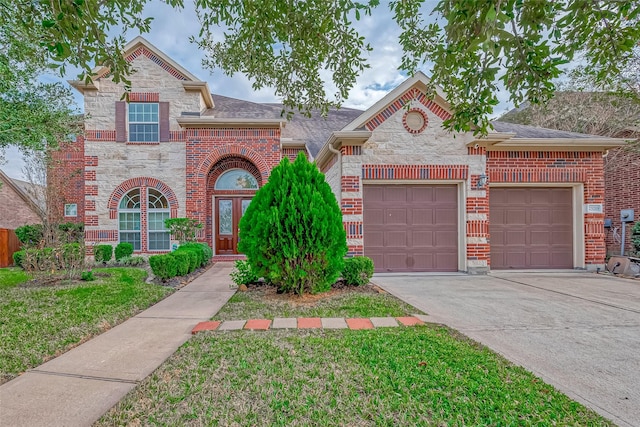 traditional-style home featuring a garage, a front yard, stone siding, brick siding, and concrete driveway
