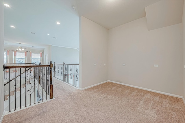 unfurnished room featuring carpet floors, visible vents, baseboards, ceiling fan, and recessed lighting