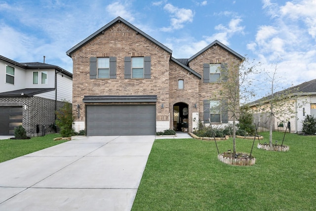 29407 Red Rocks Park Dr, Katy, TX 77494 - view of front facade featuring concrete driveway, brick siding, an attached garage, and a front yard